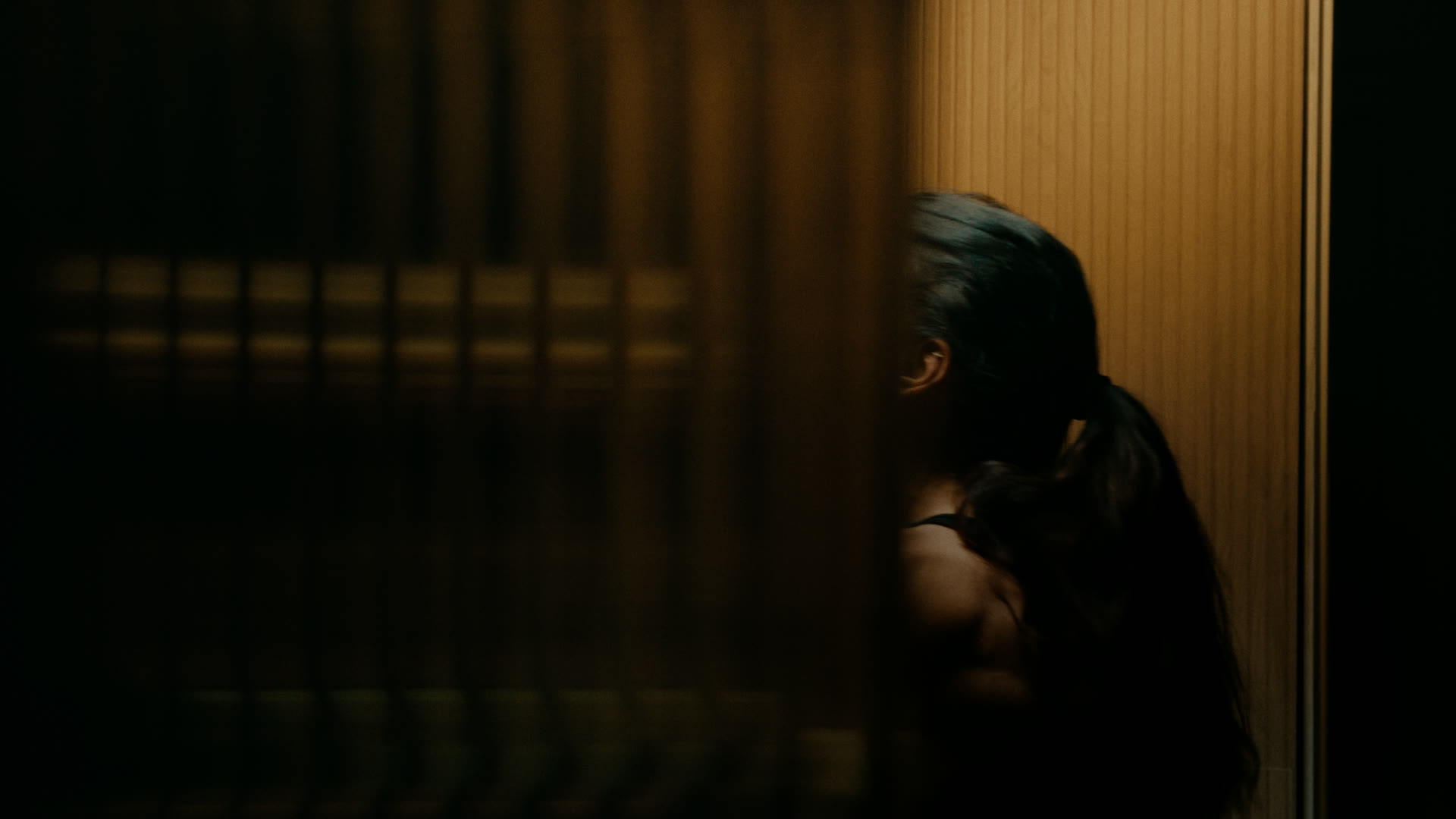 Bathroom interior in low light — still from Nobody Home