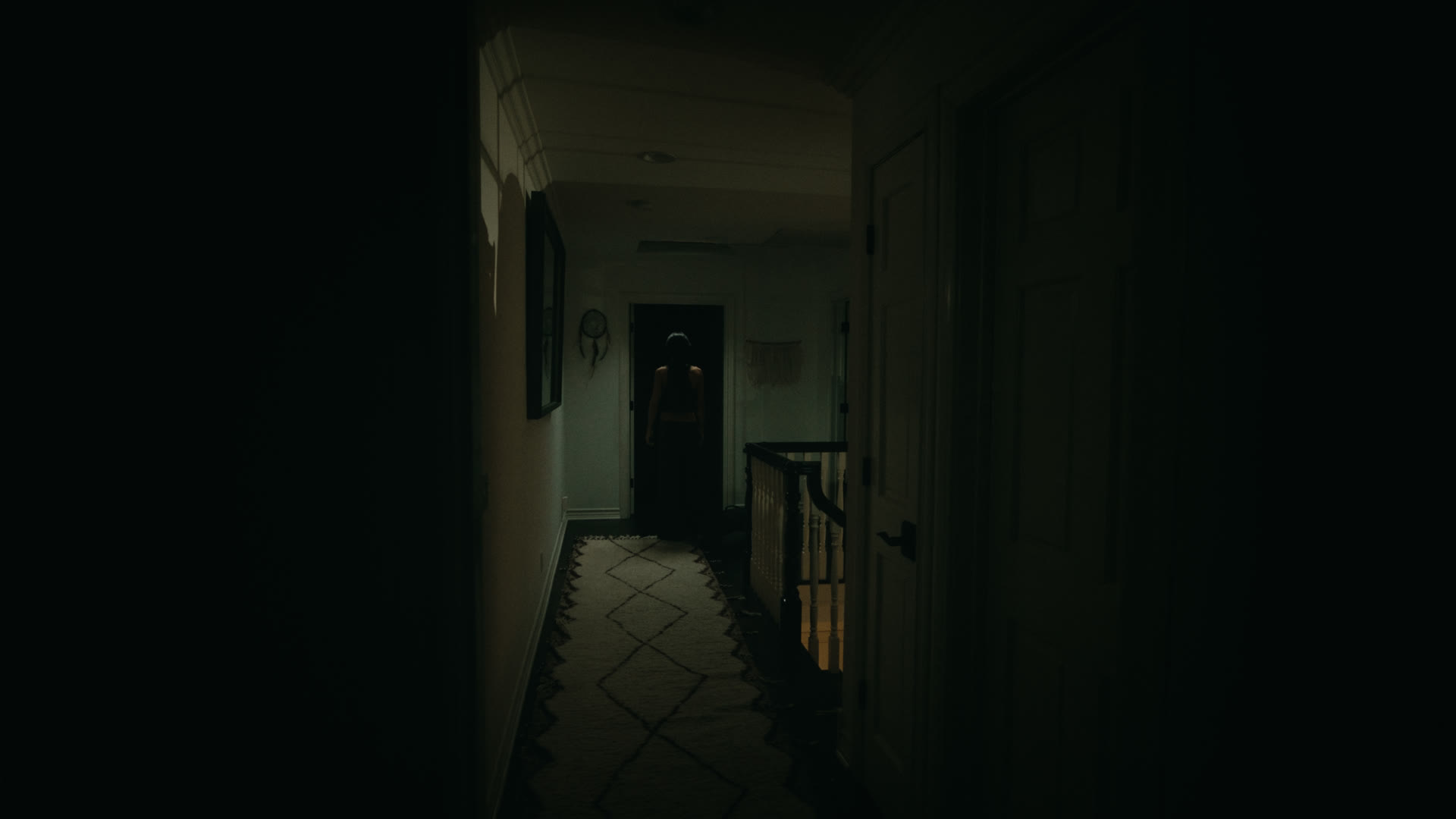 The front door in darkness — still from Nobody Home