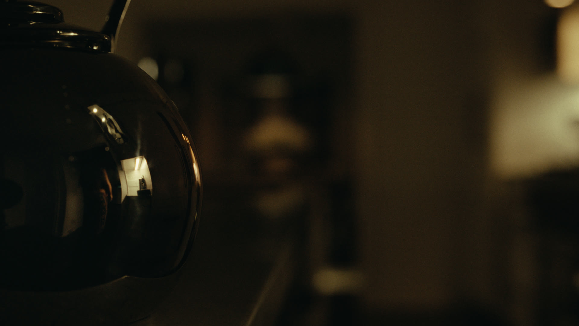 Kitchen scene in shadow — still from Nobody Home